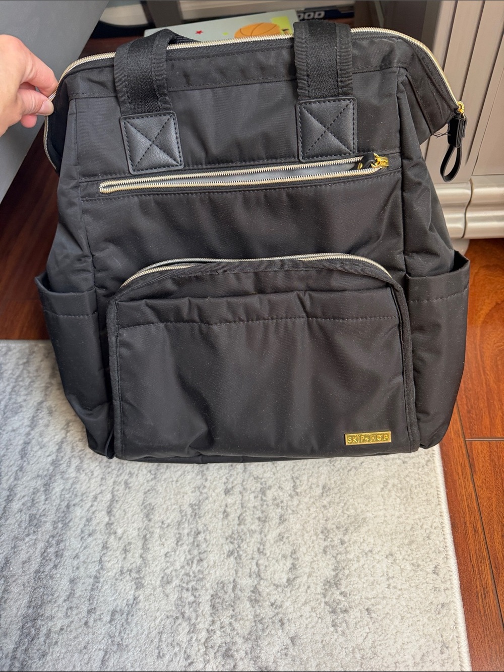 Skip Hop Black Nylon Backpack Diaper Bag with Gold Accents